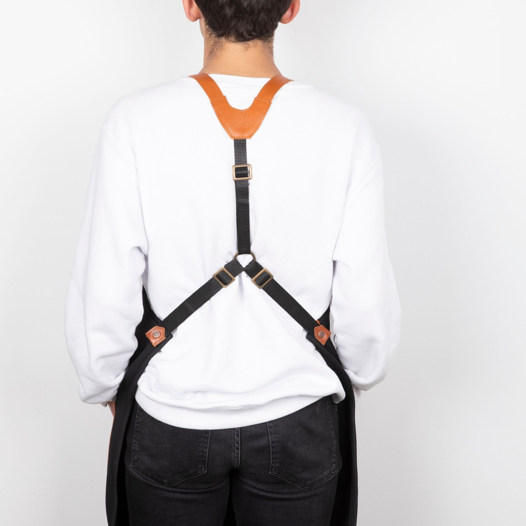 Delantal de cuero hecho a mano protección versátil ajuste cómodo con correas ajustables múltiples bolsillos para almacenamiento limpieza sencilla